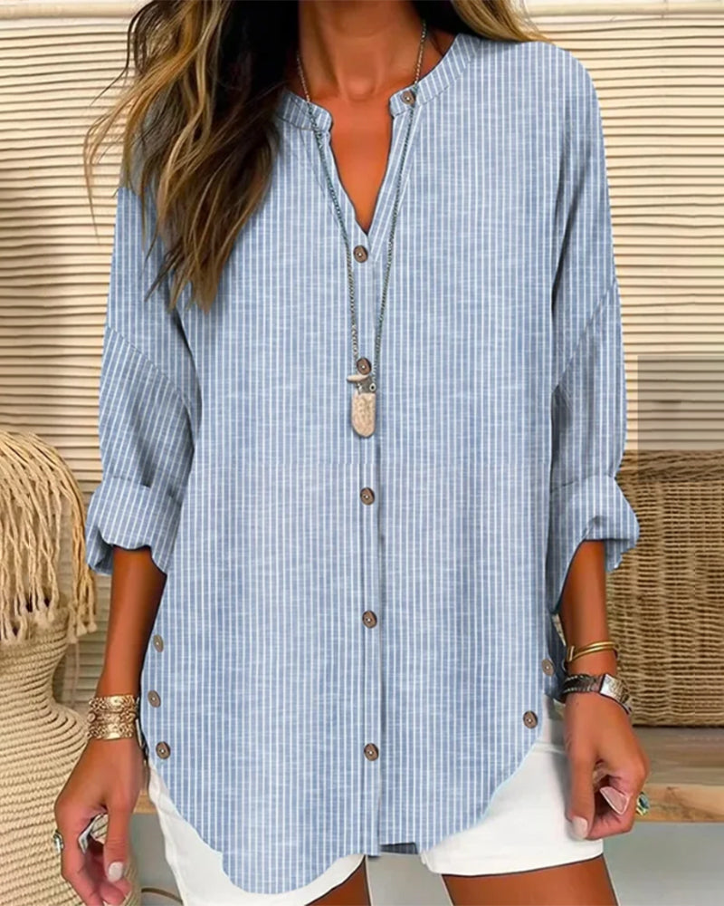 Women's blouse – Loose fit – Breathable fabric – Subtle stripes – Buttoned V neck