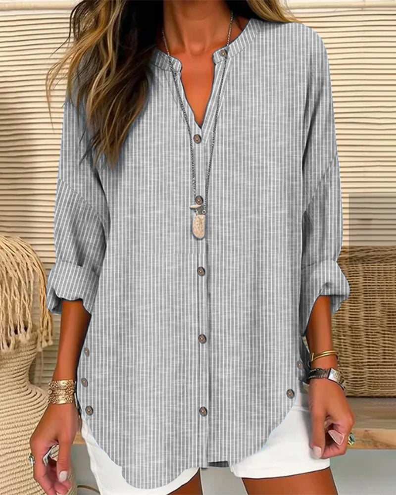 Women's blouse – Loose fit – Breathable fabric – Subtle stripes – Buttoned V neck