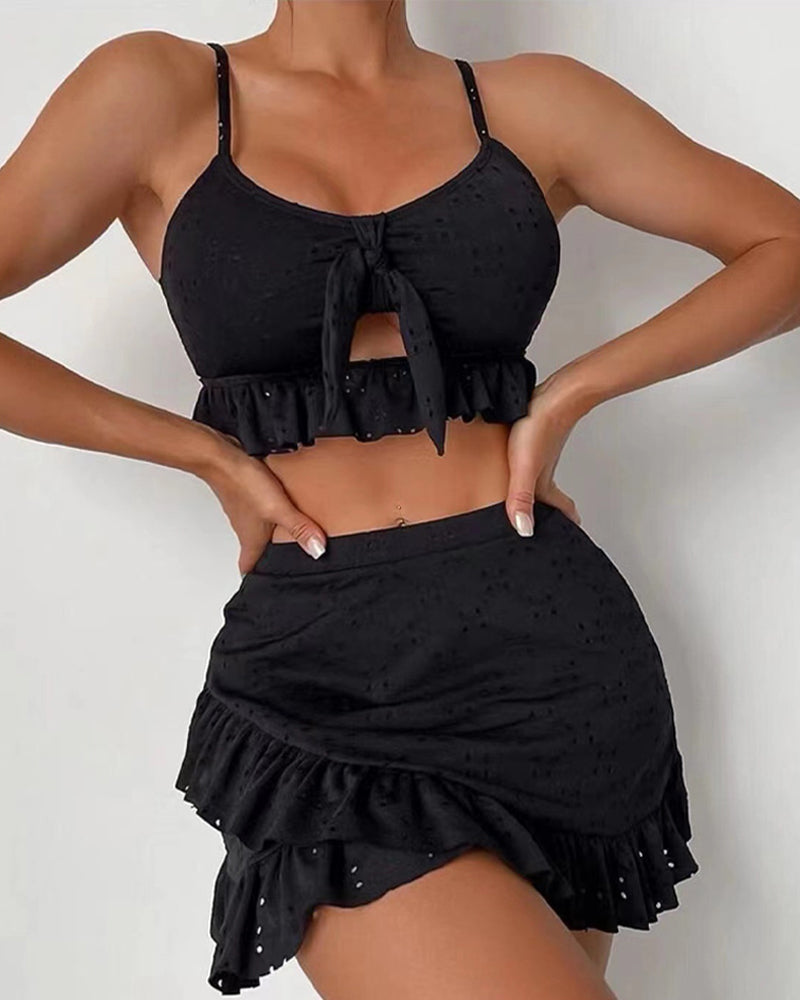 Women's swimsuit – Set knotted top and ruffled skirt – Light eyelet embroidery