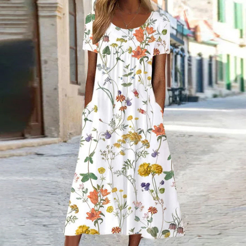 Women's midi dress – Flared cut – Breathable fabric – Floral print – Short sleeves – Pockets