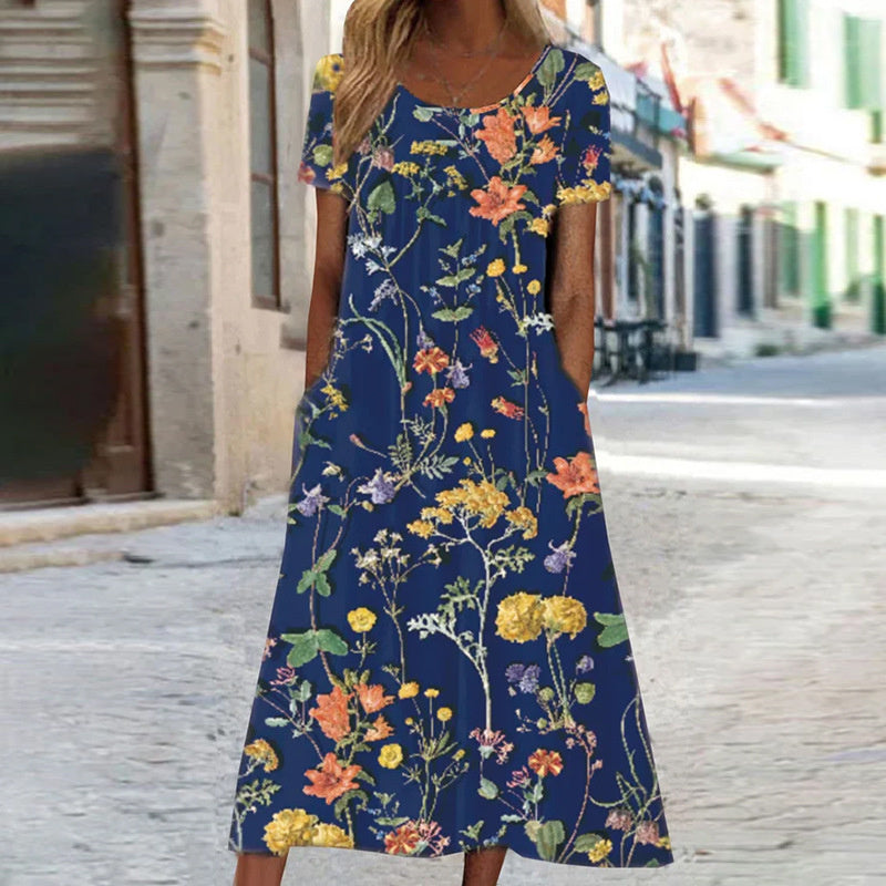 Women's midi dress – Flared cut – Breathable fabric – Floral print – Short sleeves – Pockets