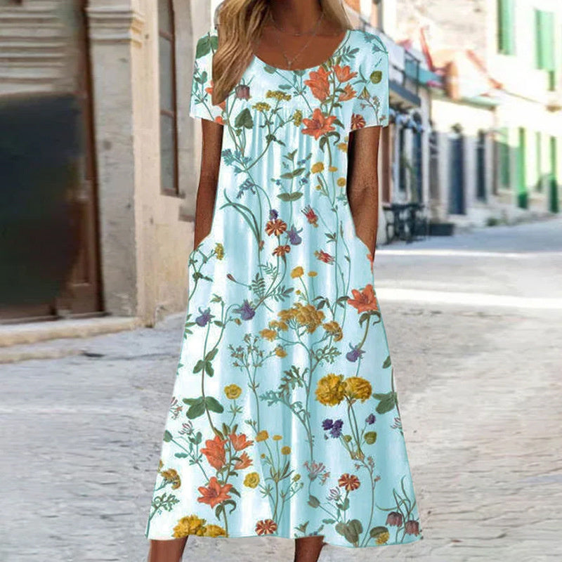 Women's midi dress – Flared cut – Breathable fabric – Floral print – Short sleeves – Pockets
