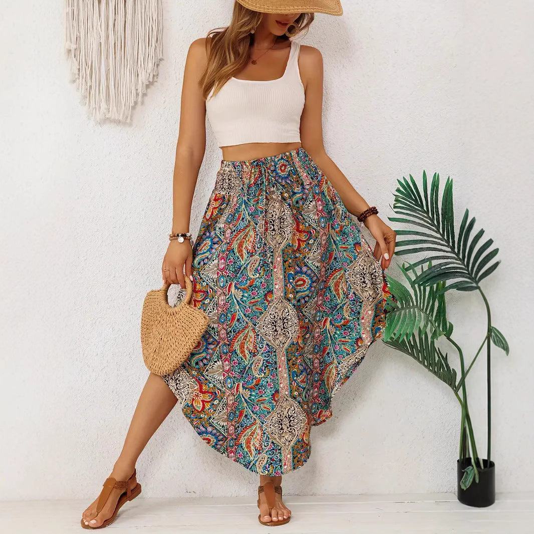 Women's midi skirt – High waist – Flared fluid cut – Exotic print – Asymmetric hem