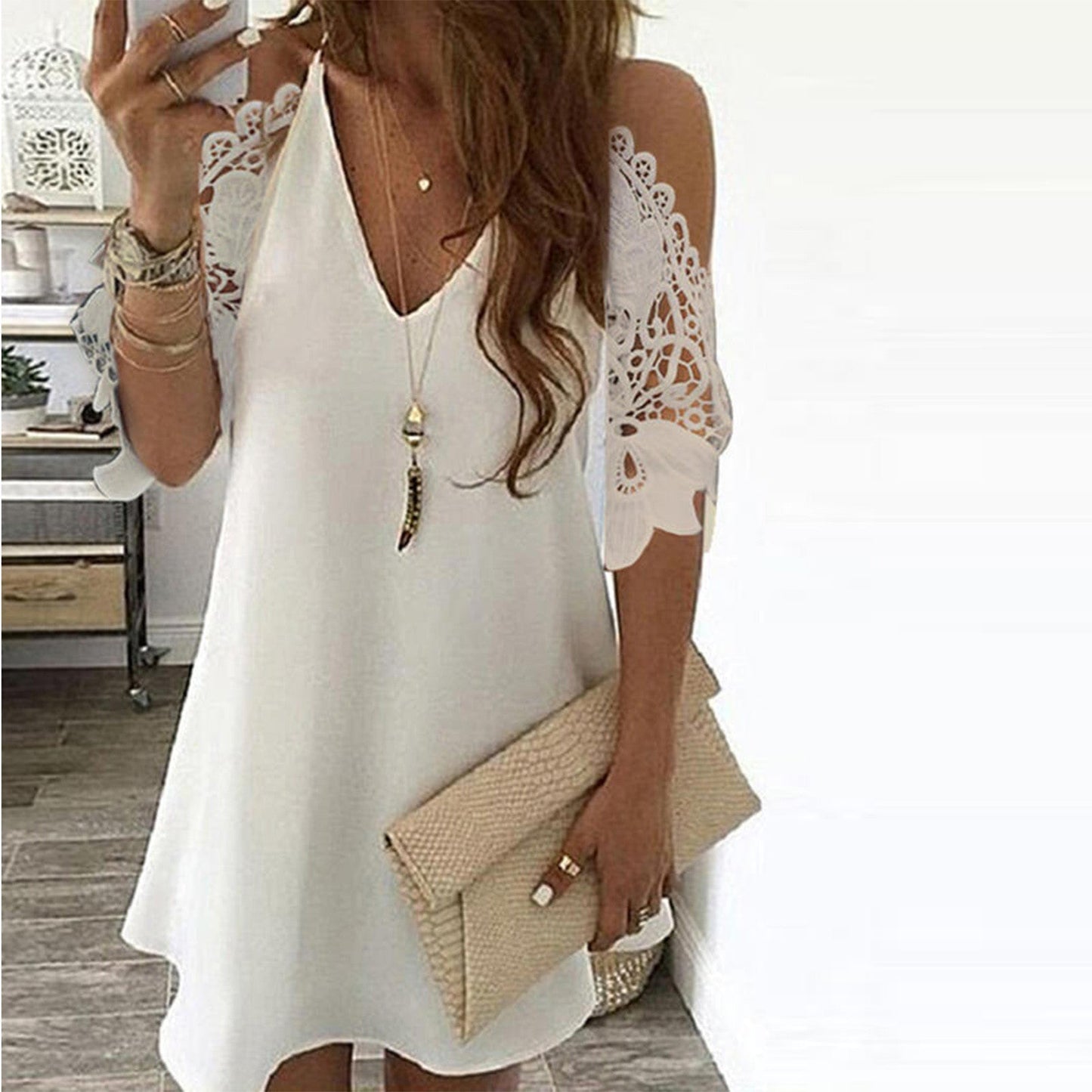 Women's trapeze dress – mini length – lace sleeves bare shoulders – V-neck