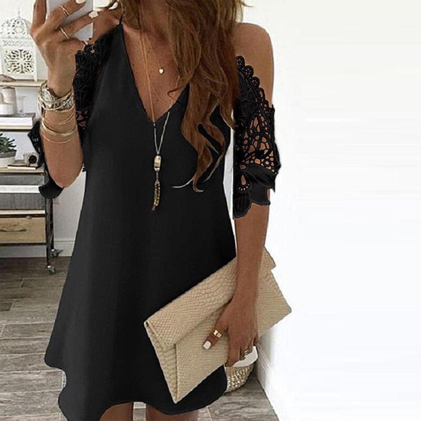 Women's trapeze dress – mini length – lace sleeves bare shoulders – V-neck