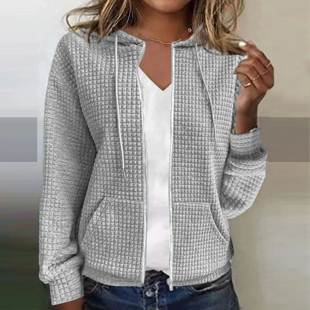 Veste à capuche femme – Coupe droite – Texture matelassée douce – Fermeture zippée