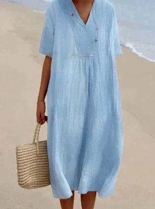 Robe femme ample – tissu respirant – manches courtes – col en V – coupe midi fluide
