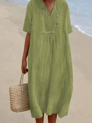 Robe femme ample – tissu respirant – manches courtes – col en V – coupe midi fluide