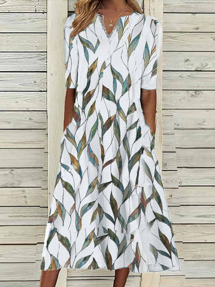 Women's midi dress – Relaxed fit – Breathable fabric – Leaf print – Pockets