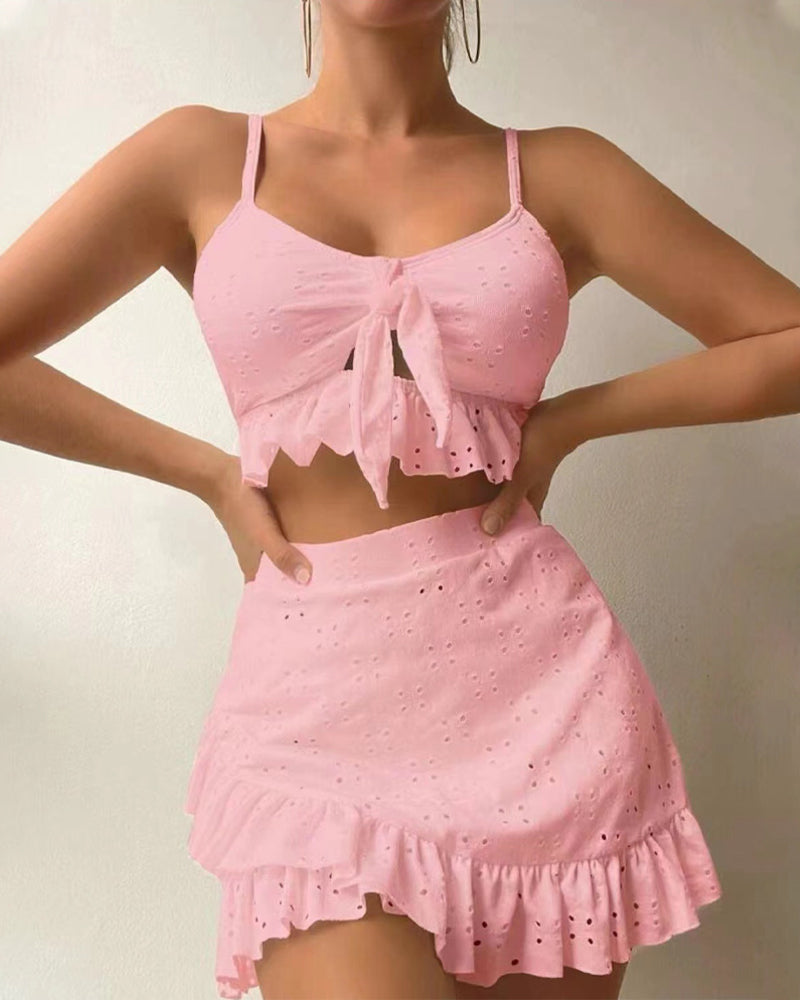 Women's swimsuit – Set knotted top and ruffled skirt – Light eyelet embroidery