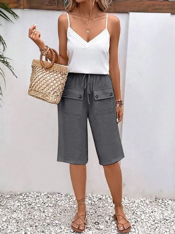 Women's mid-length pants – Relaxed fit – Elastic waistband – Breathable fabric – Buttoned pockets