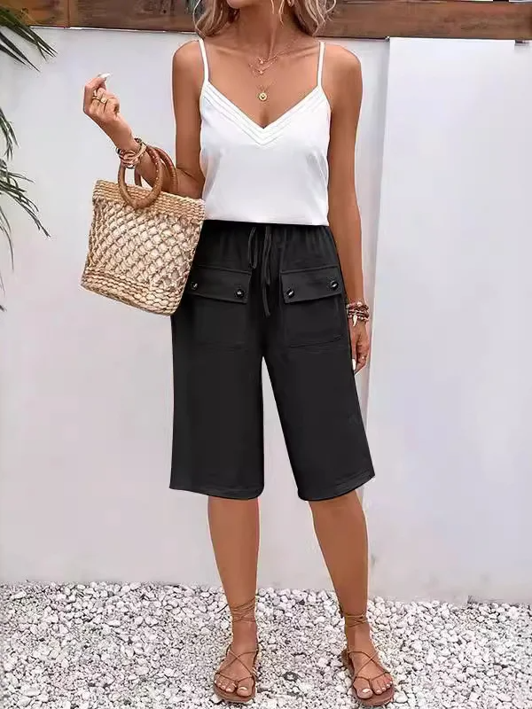 Women's mid-length pants – Relaxed fit – Elastic waistband – Breathable fabric – Buttoned pockets