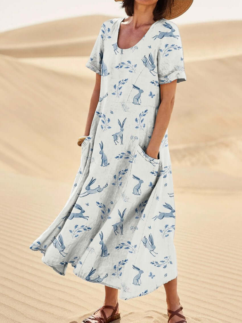 Women's midi dress – Relaxed fit – Short sleeves – Round neckline – Natural fibers – Artistic print – With pockets