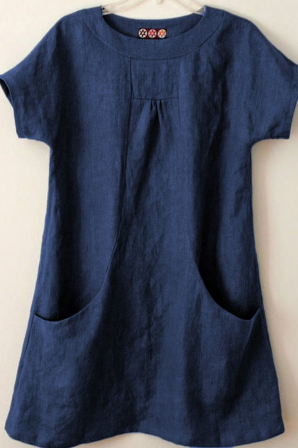 Women's blouse – Loose fit – Short sleeves – Natural fibers – Front pockets