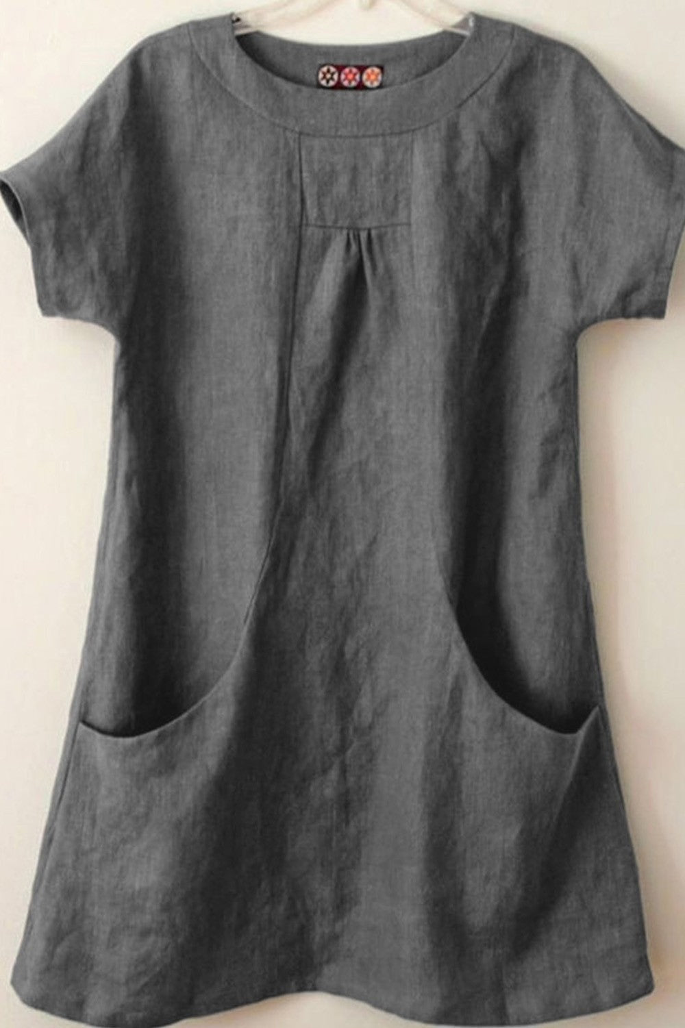 Women's blouse – Loose fit – Short sleeves – Natural fibers – Front pockets