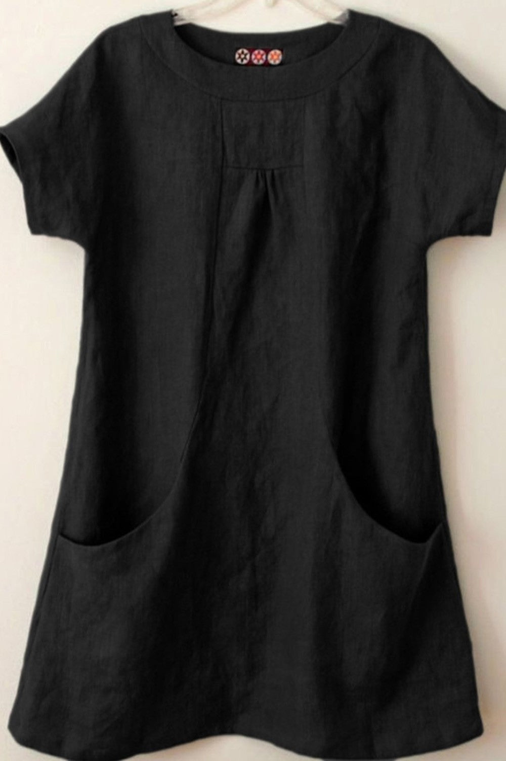 Women's blouse – Loose fit – Short sleeves – Natural fibers – Front pockets