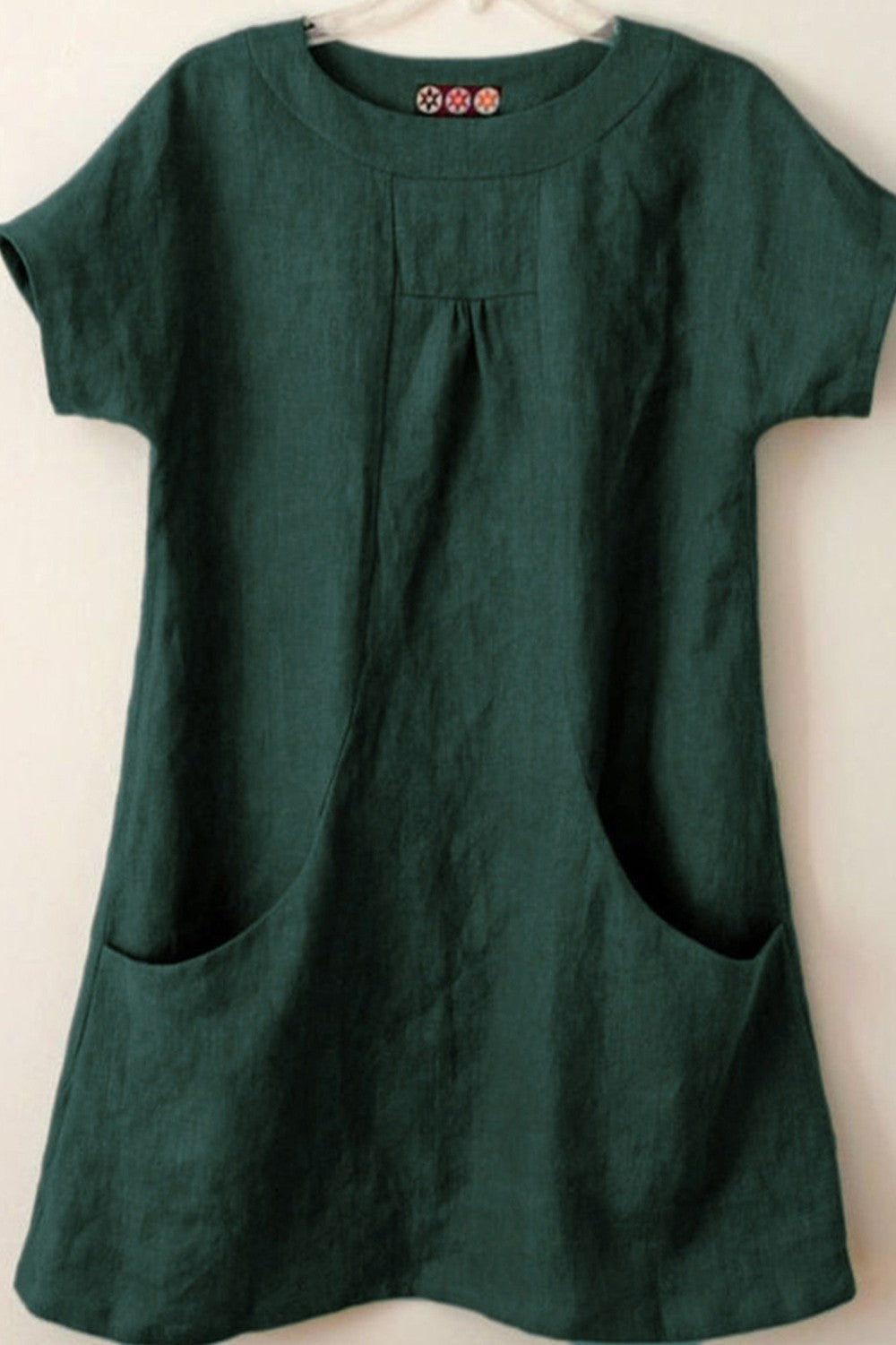 Women's blouse – Loose fit – Short sleeves – Natural fibers – Front pockets