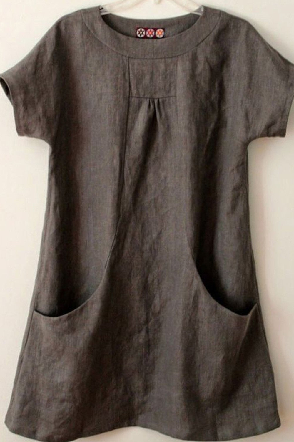 Women's blouse – Loose fit – Short sleeves – Natural fibers – Front pockets