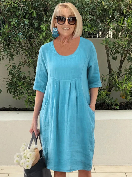 Women's midi dress – Loose fit – Natural fibers – Elbow sleeves – Round neck – Pockets