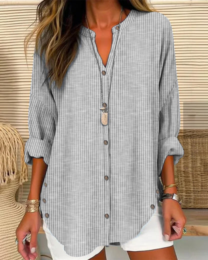 Women's blouse – Loose fit – Breathable fabric – Subtle stripes – Buttoned V neck
