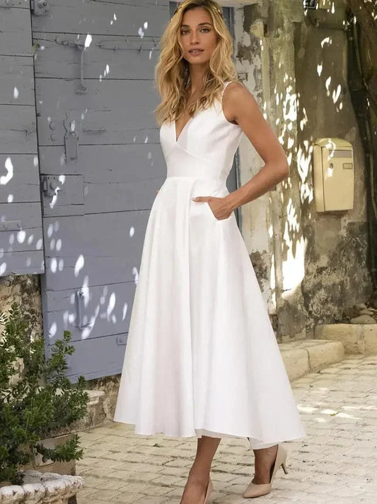 Women's midi dress – Flared cut – V-neckline – Thin straps – Breathable fabric