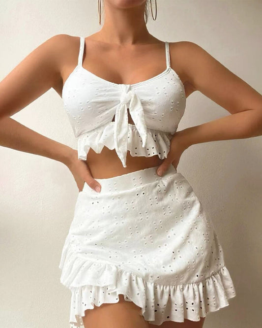 Women's swimsuit – Set knotted top and ruffled skirt – Light eyelet embroidery