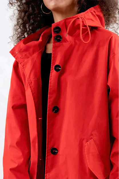 Veste imperméable femme – Coupe ample – Capuche ajustable – Boutonnage – Poches