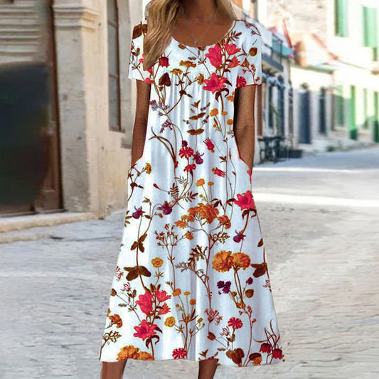 Women's midi dress – Flared cut – Breathable fabric – Floral print – Short sleeves – Pockets