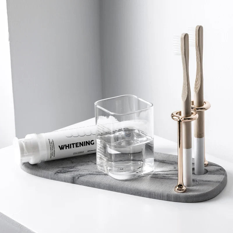 Minimalist Marble-Like Toothbrush Holder With Metal Coils