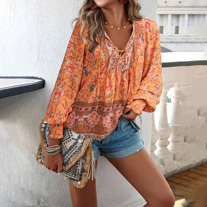 Women's blouse – Loose fit – Lightweight breathable fabric – Long sleeves with smocked cuffs – Tie-neck bohemian style