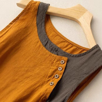 Sleeveless women's top – Relaxed fit – Asymmetric hem – Buttoned details