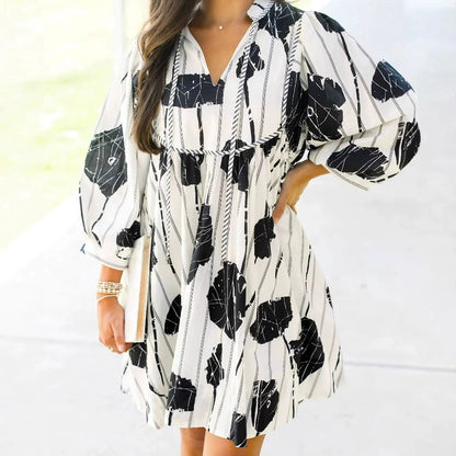 Women's dress – Flowing cut – Floral print – Long sleeves – V-neck – Breathable fabric