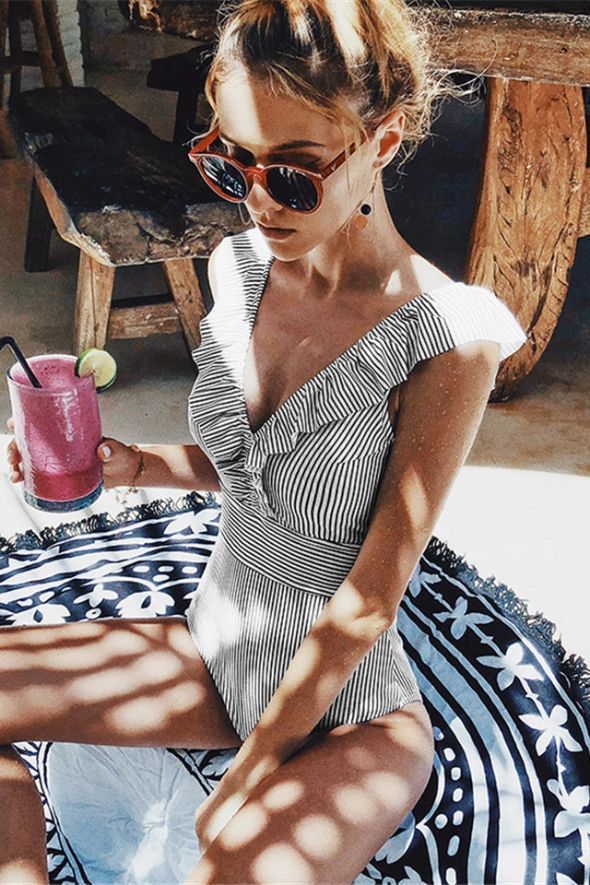 Women's one-piece swimsuit – Ruffled neckline – Vertical stripes – Fitted cut – Breathable fabric