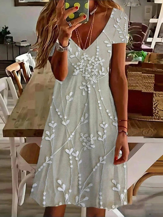 Robe mini femme – Coupe évasée – Décolleté en V – Manches courtes – Tissu respirant – Motif feuilles