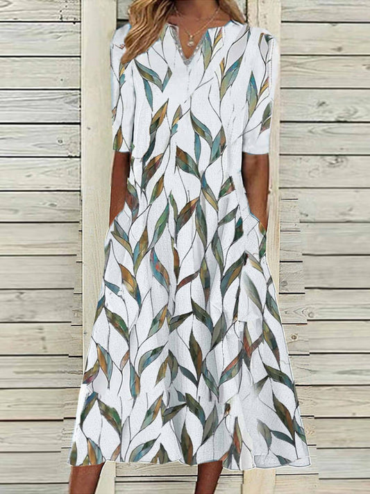 Women's midi dress – Relaxed fit – Breathable fabric – Leaf print – Pockets