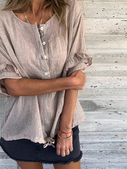 Women's blouse – Relaxed fit – Natural fibers – Ruffled sleeves – Adjustable hem