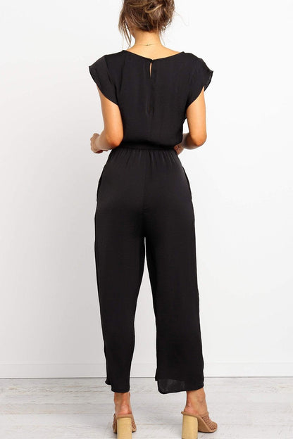 Women's jumpsuit – Loose fit – V-neck – Self-tie belt – Short sleeves – Pockets