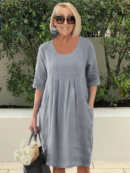 Women's midi dress – Loose fit – Natural fibers – Elbow sleeves – Round neck – Pockets