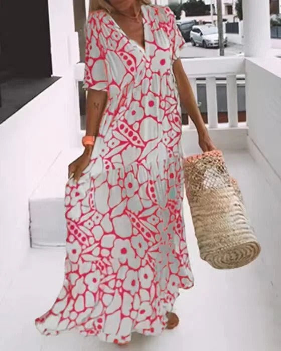 Women's long dress – Flared cut – Breathable fabric – V-neck – Short sleeves – Floral print
