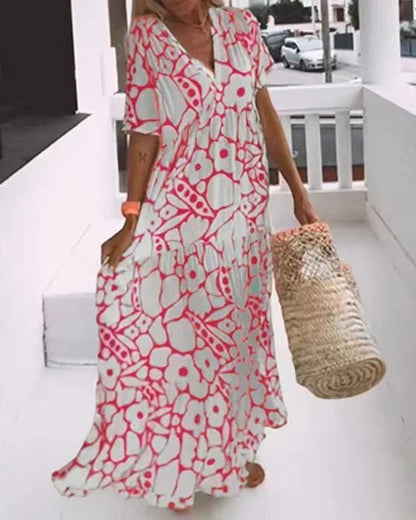 Women's long dress – Flared cut – Breathable fabric – V-neck – Short sleeves – Floral print