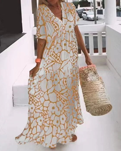 Women's long dress – Flared cut – Breathable fabric – V-neck – Short sleeves – Floral print