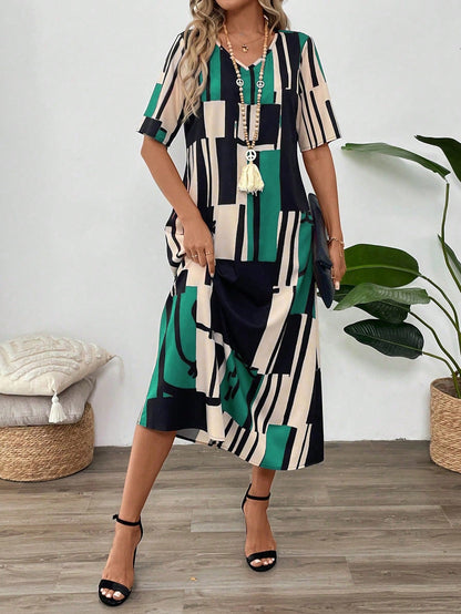 Women's long dress – Loose fit – V-neck – Short sleeves – Fluid abstract prints