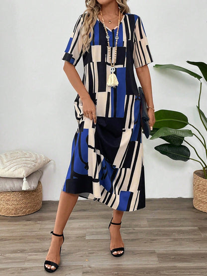 Women's long dress – Loose fit – V-neck – Short sleeves – Fluid abstract prints