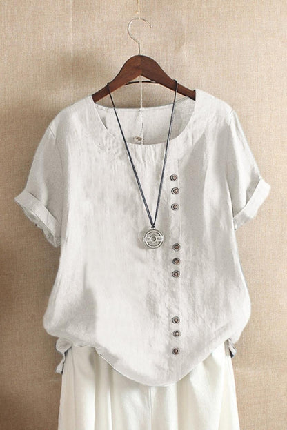 Women's blouse – Loose fit – Natural fibers – Short sleeves – Round neck – Decorative buttons