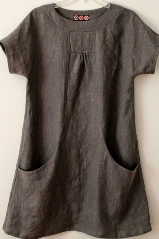 Women's blouse – Loose fit – Short sleeves – Natural fibers – Front pockets